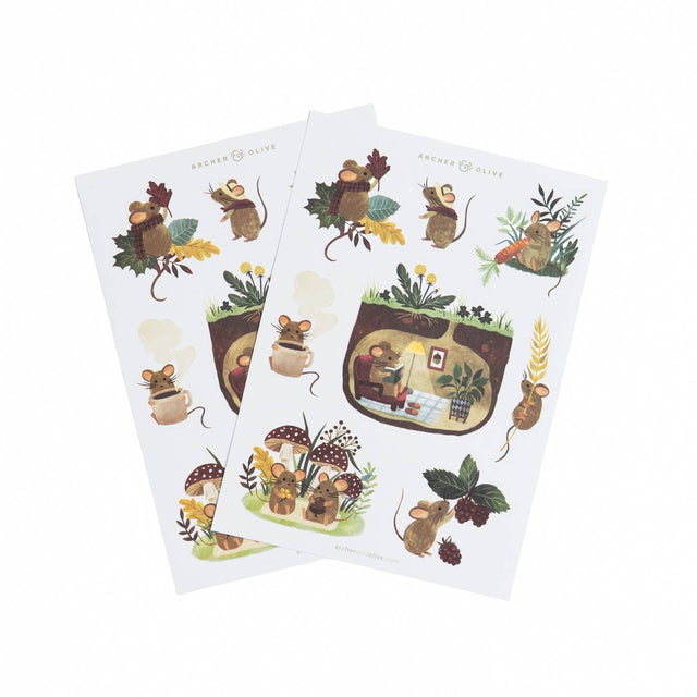 Two sheets of decorative paper with mouse illustrations and nature elements on a white background.