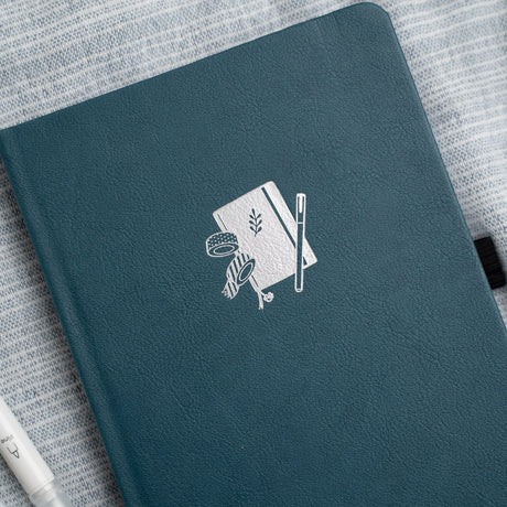 Archer and Olive presents the A5 Doorbuster - Superfan, a stationery essential for journaling enthusiasts. Our journal/diary is a trusted companion for those who value mental wellness and express creativity. This A5-sized journal features our iconic design, providing a perfect space for your thoughts, plans, and ideas. It is a must-have for anyone who appreciates the art of writing. Whether you're a seasoned journaler or just starting your journey, our A5 Doorbuster - Superfan journal is your perfect partne