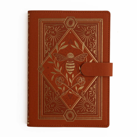 Awaken your creativity with a touch of warmth and wonder. The Keeper of the Bees Deluxe System in Rust blends golden honeybee symbolism with rich autumn tones, creating a journal cover that feels both magical and grounding. It’s an inspiring place to nurture ideas, collect memories, and build a planning system that evolves alongside you.
