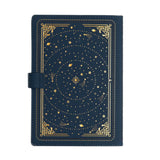 Blue notebook with gold star pattern on a white background