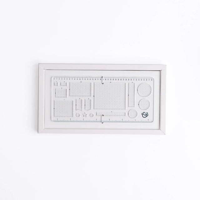 Get precise and achieve perfect outlines in your journal with our A5 Dot Grid Planning Stencil. This handy grid spacing guide helps you measure out your bullet journal spreads with ease. Simply pick a layout and use the dot grid journal ruler to mark out each box.

The stencil features half square notches, guide boxes, helpful shapes, and more so you can quickly create an entire journaling spread without the worry of counting dots or having uneven lines!

This stencil is particularly helpful for A5 notebook
