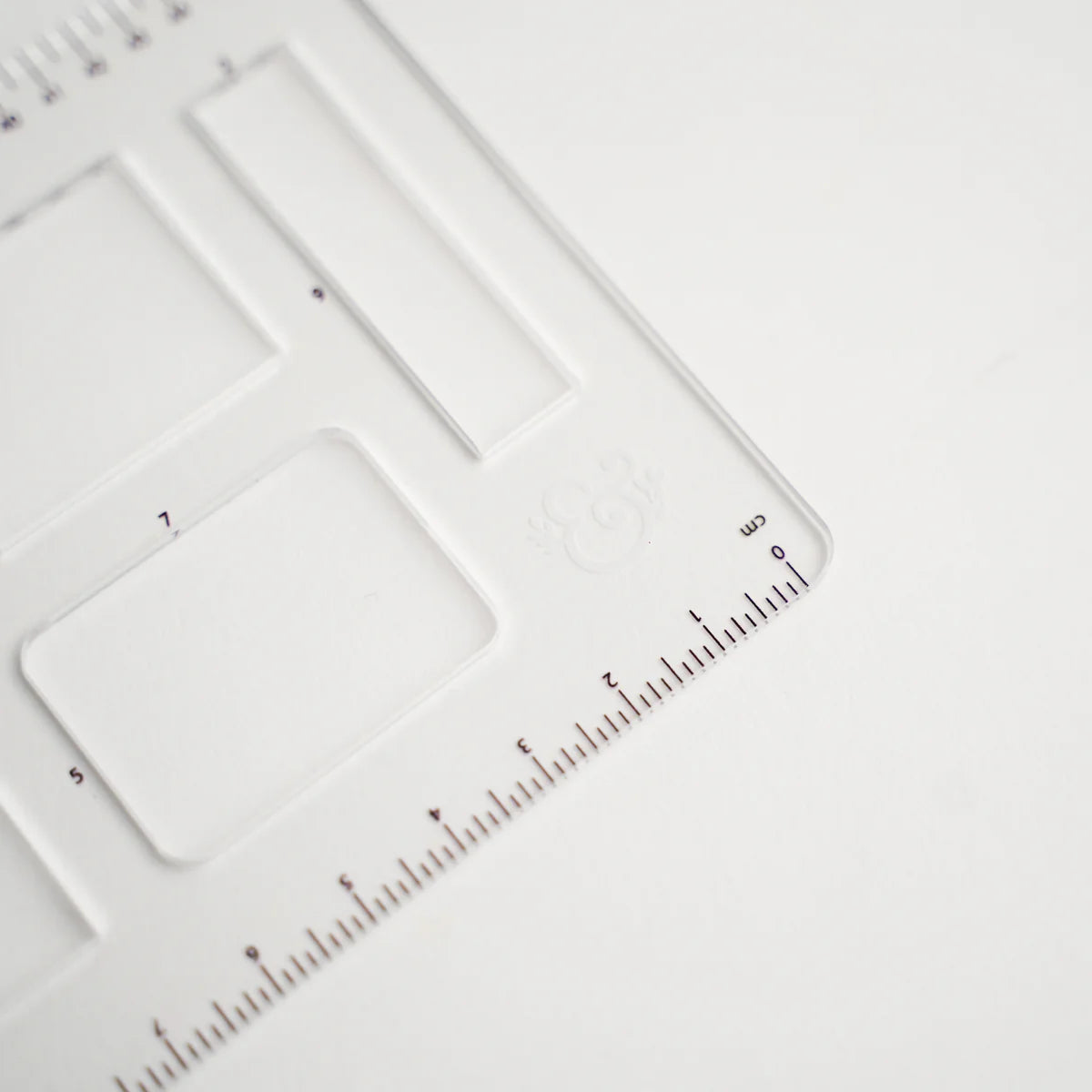 This clear B5 Dot Grid Planning Stencil helps you measure out your bullet journal spreads with ease. New and improved with thicker plastic to help you get precise and achieve perfect outlines in your journal with our stencil.

The stencil features guide boxes, helpful shapes, and more so you can quickly create an entire journaling spread without the worry of counting dots or having uneven lines!

This stencil is particularly helpful for B5 notebooks as you can use the circle guides to find the center of a B