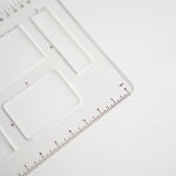 This clear B5 Dot Grid Planning Stencil helps you measure out your bullet journal spreads with ease. New and improved with thicker plastic to help you get precise and achieve perfect outlines in your journal with our stencil.

The stencil features guide boxes, helpful shapes, and more so you can quickly create an entire journaling spread without the worry of counting dots or having uneven lines!

This stencil is particularly helpful for B5 notebooks as you can use the circle guides to find the center of a B