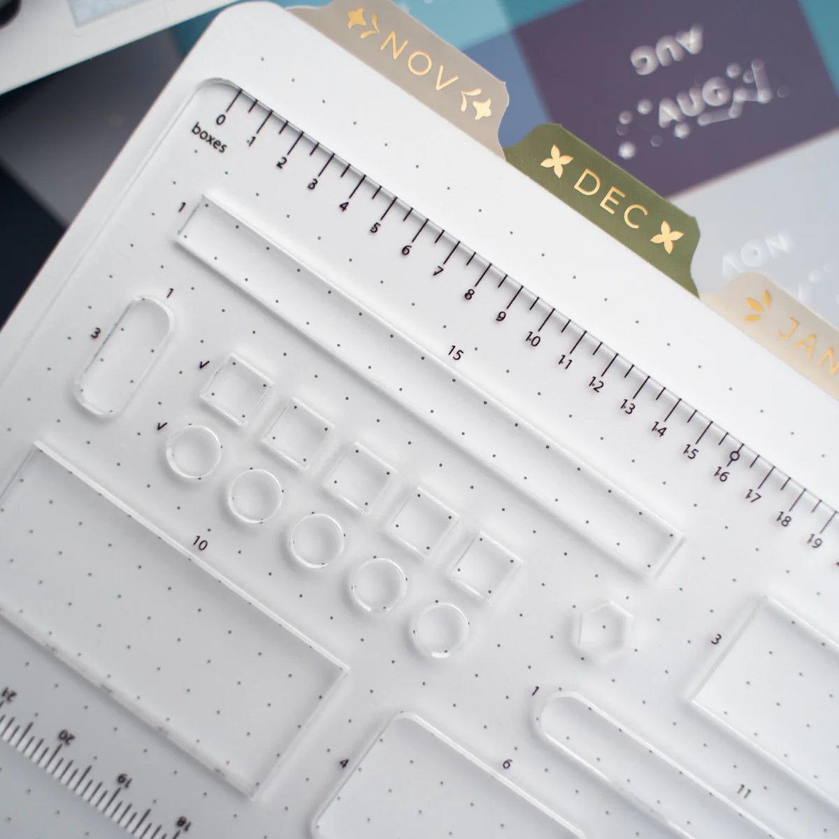 This clear B5 Dot Grid Planning Stencil helps you measure out your bullet journal spreads with ease. New and improved with thicker plastic to help you get precise and achieve perfect outlines in your journal with our stencil.

The stencil features guide boxes, helpful shapes, and more so you can quickly create an entire journaling spread without the worry of counting dots or having uneven lines!

This stencil is particularly helpful for B5 notebooks as you can use the circle guides to find the center of a B