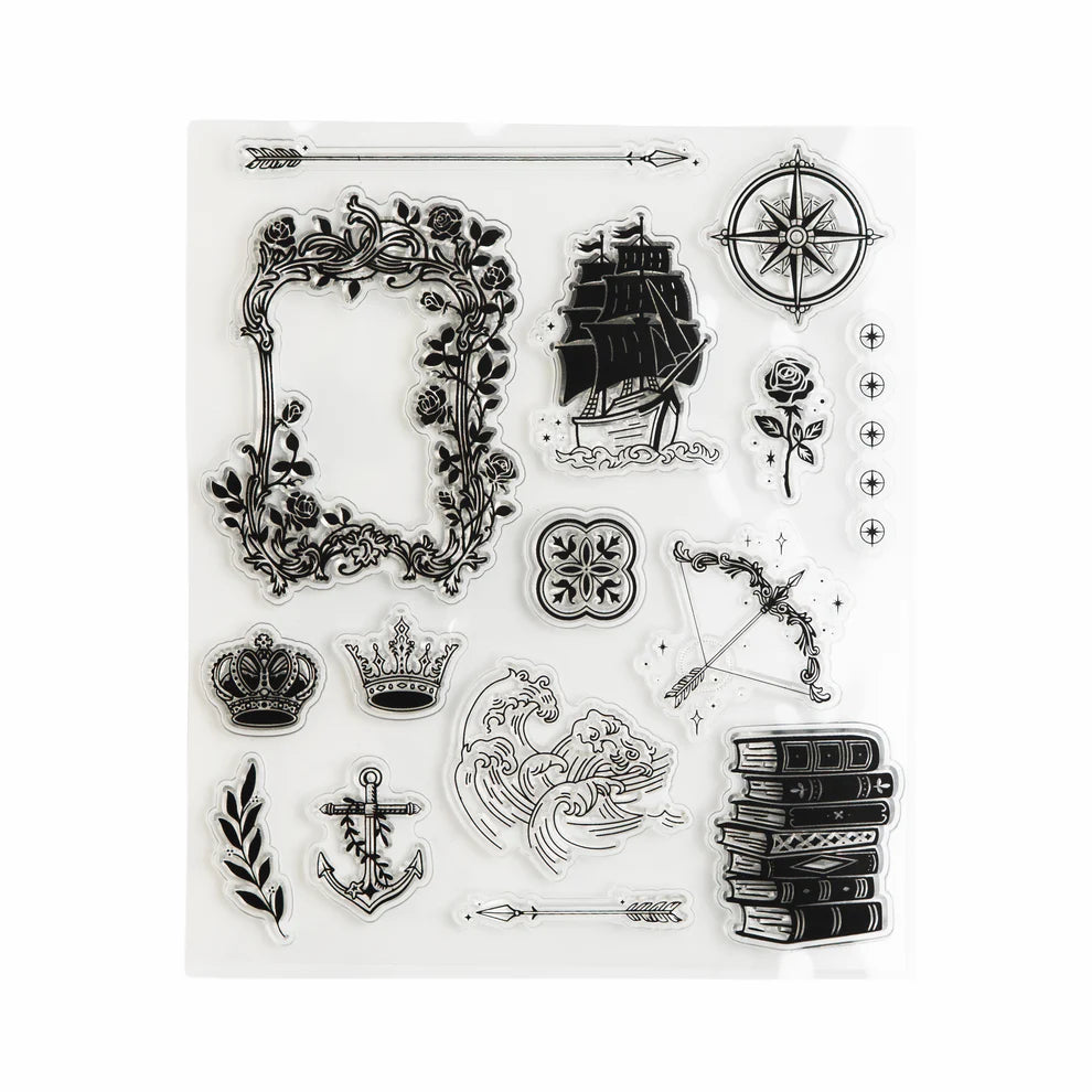 Add enchanted details to your pages with the Enchanted Chapters Stamp Set. Featuring books, ships arrows, anchors, and crowns, these reusable clear acrylic stamps are perfect for layering creative designs in your journal, planner, or scrapbook.
