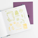 Add enchanted details to your pages with the Enchanted Chapters Stamp Set. Featuring books, ships arrows, anchors, and crowns, these reusable clear acrylic stamps are perfect for layering creative designs in your journal, planner, or scrapbook.