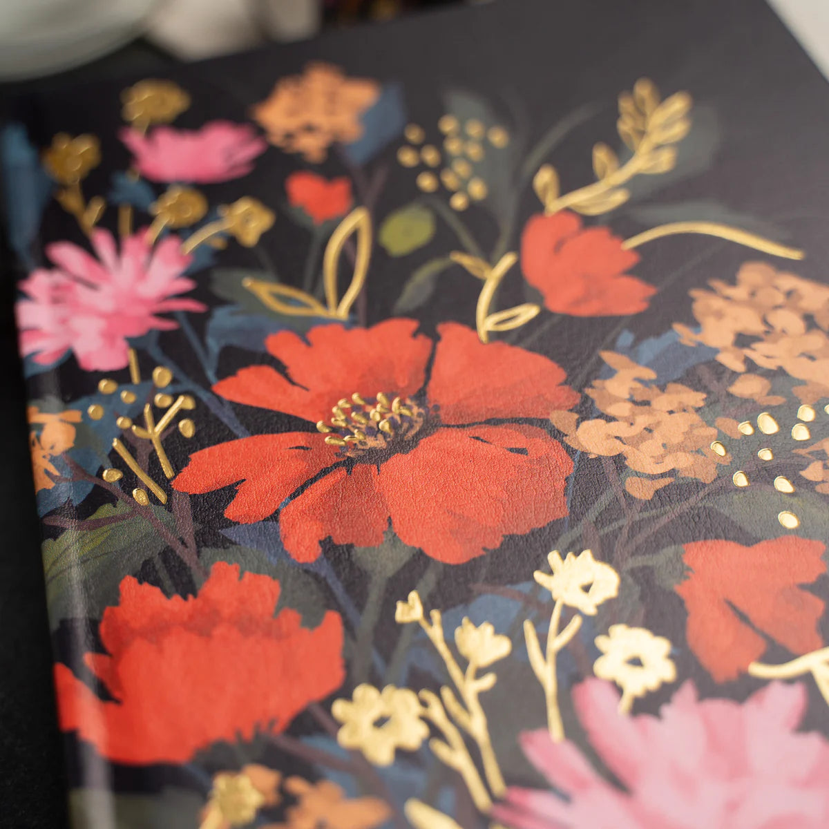 Nurture your creativity with the Flourish Self Care Box, a beautifully curated collection designed with mental wellness in mind. Designed with intention, this box brings together everything you need to begin (or return to) a meaningful creative practice.

Inside you will find: 

A5 Bloom & Grow Notebook: featuring a full cover printed abstract floral design, hand stamped with gold foil accents on a vegan leather cover.

Writing Set: including a 0.5mm Ballpoint Pen and Mechanical Pencil with Eraser, both emb
