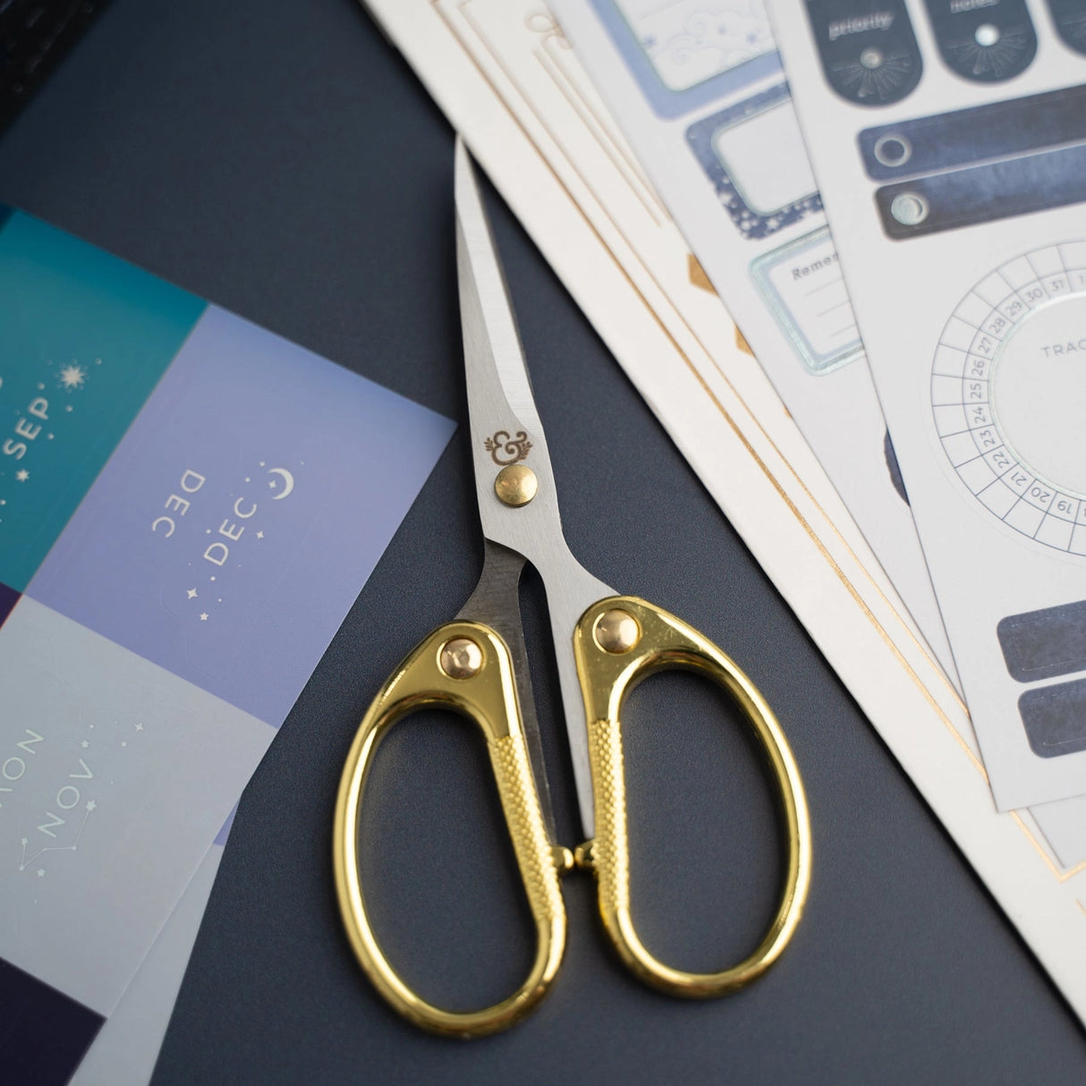 Archer and Olive Gold-Handled Stationery Scissors

Introducing our Gold-Handled Stationery Scissors, a perfect blend of elegance and functionality. With their stunning gold-colored handles and sharp stainless steel blades, these scissors offer precise cuts and a comfortable grip. Whether you're crafting, trimming paper, or tackling creative projects, these scissors deliver exceptional performance every time.

Designed for durability and comfort, they provide a balance of maneuverability and control. Make a 