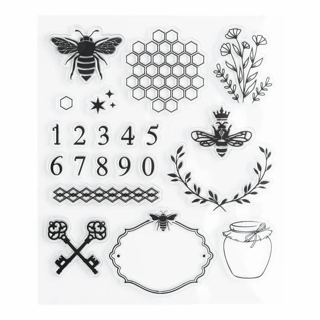 A charming clear stamp set inspired by classic beekeeping motifs and vintage apothecary details. Featuring bees, honeycomb, wildflowers, ornate keys, numerals, and decorative labels, this set brings a playful yet timeless touch to journaling and creative spreads.

Specs &amp; Details:

Stamp Type: Clear, reusable acrylic stamps
Design Theme: Bees, honeycomb, florals, vintage keys, labels, numbers
Material: High-quality photopolymer
Use: Ideal for reading journals, planners, book reviews, and creative spread