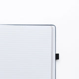 Introducing the&nbsp;Heirloom&nbsp;notebook.&nbsp;This&nbsp;Letter Sized&nbsp;notebook is truly special,&nbsp;featuring a unique full cover design. The&nbsp;intricate foliage pattern and fountain pen is&nbsp;debossed&nbsp;on a&nbsp;suede-like blue vegan leather cover,&nbsp;finished with&nbsp;a vintage&nbsp;rose gold stamping.


This notebook comes with the choice of&nbsp;Dot Grid&nbsp;or&nbsp;Lined&nbsp;pages, and is the perfect journal for a special occasion. From a memory keeping scrapbook to wedding gues