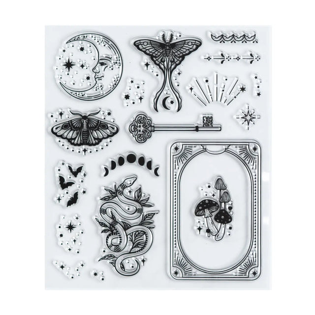 Add enchanted details to your pages with the Moonshade Stamp Set. Featuring celestial moths, moons, keys, mushrooms, and stars, these reusable clear acrylic stamps are perfect for layering creative designs in your journal, planner, or scrapbook.

Set of clear acrylic stamps with celestial + nature motifs

Works with acrylic blocks and standard ink pads

Reusable and easy to clean

Great for journaling, scrapbooking, and cardmaking