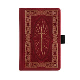 A bold, medieval-inspired notebook designed for adventurers at heart—perfect for journaling, planning, or capturing your next great story. Featuring a rich crimson vegan leather cover with intricate gold-foil detailing and a radiant sword centerpiece, this notebook feels like a treasured tome pulled from a castle library.
