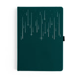 Quiet, expansive, and full of wonder — the Meteor Shower Notebook captures the magic of watching the night sky come alive. A deep, moody cover is scattered with delicate shooting stars, creating a sense of calm movement and cosmic possibility. It’s a notebook made for late-night thoughts, creative sparks, and ideas that arrive like falling stars.