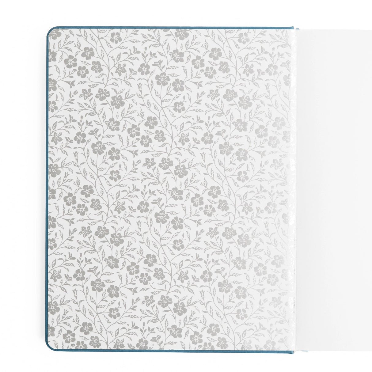 Wild Periwinkle Notebook

Let your creativity unfurl like a field of wildflowers. The Wild Periwinkle Notebook pairs soft blue tones with delicate white florals, creating a peaceful place to gather your thoughts, start new projects, and savor quiet moments of reflection. It’s a beautifully timeless companion for journaling, planning, or everyday inspiration.