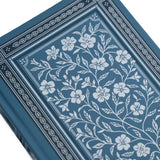 Wild Periwinkle Notebook

Let your creativity unfurl like a field of wildflowers. The Wild Periwinkle Notebook pairs soft blue tones with delicate white florals, creating a peaceful place to gather your thoughts, start new projects, and savor quiet moments of reflection. It’s a beautifully timeless companion for journaling, planning, or everyday inspiration.