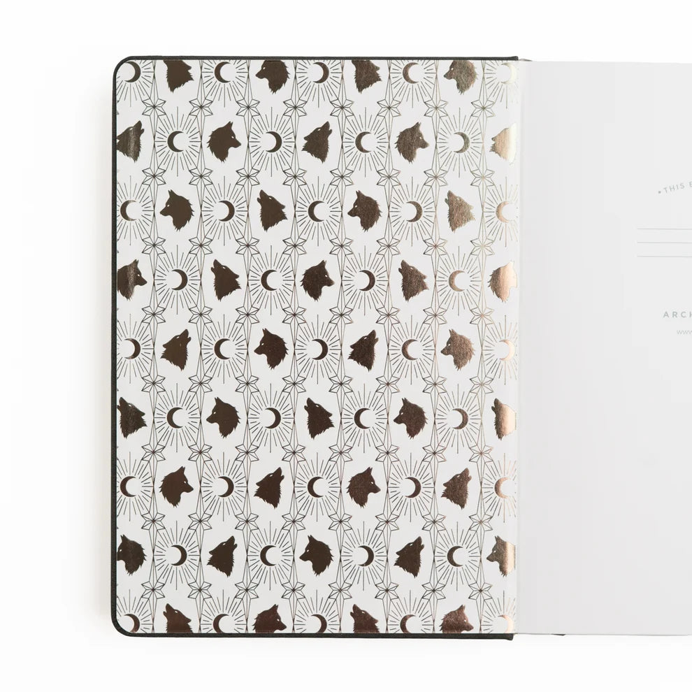 Step quietly into the moonlit forest with the Wolf in the Night Notebook, where every page invites you to embrace your intuition and let your creativity roam free.