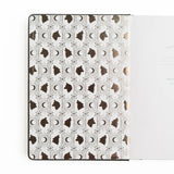 Step quietly into the moonlit forest with the Wolf in the Night Notebook, where every page invites you to embrace your intuition and let your creativity roam free.