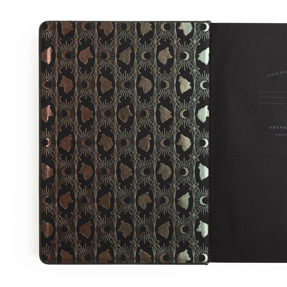 Step quietly into the moonlit forest with the Wolf in the Night Notebook, where every page invites you to embrace your intuition and let your creativity roam free.