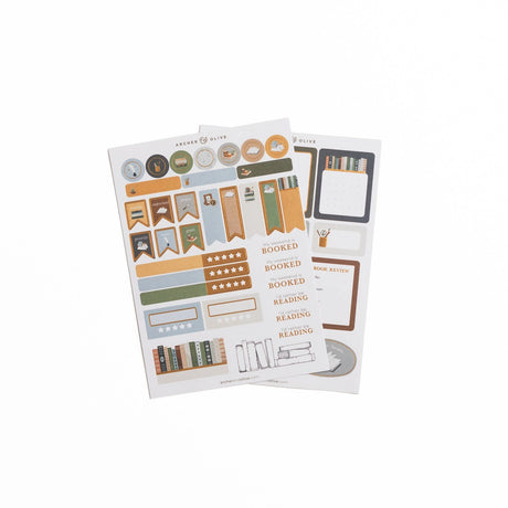 Capture a vintage library aesthetic with our Storybook Planner Stickers. Perfect to add functional and decorative touches to your planners and bullet journals, our high-quality stickers of hand illustrated designs are printed on deluxe matte paper. Each sticker set includes 2 sheets.

Stickers can be super helpful when setting up your monthly or daily bullet journal pages. This set includes useful banners, icons and boxes, alongside themed decorative elements such as bookstacks. Use these cute stickers to d