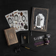 Unlock a world of haunting beauty with the Whispering Walls Halloween Box, an exclusive collection designed for journalers who adore gothic elegance and vintage mystery.