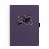 The Bewitched Notebook captures the playful spirit of Halloween with a charming black cat perched atop a broomstick beneath a crescent moon, surrounded by twinkling stars and fluttering bats.