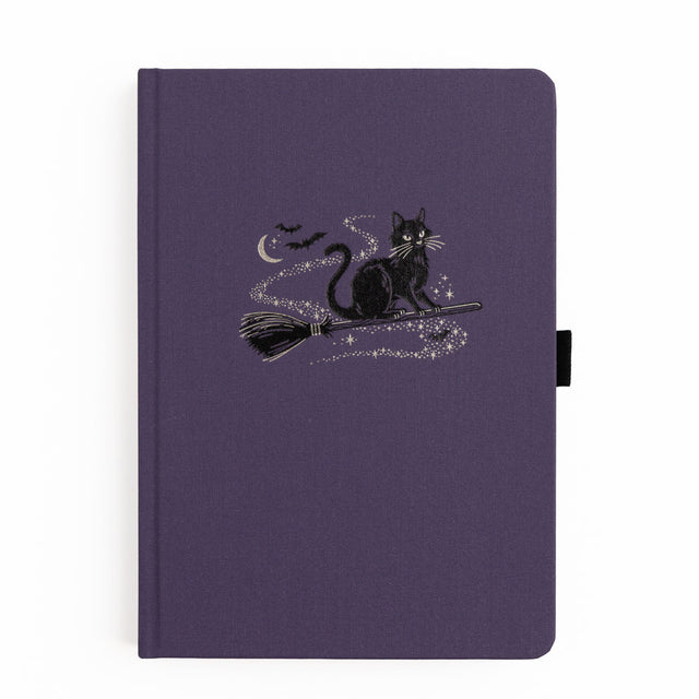 The Bewitched Notebook captures the playful spirit of Halloween with a charming black cat perched atop a broomstick beneath a crescent moon, surrounded by twinkling stars and fluttering bats.