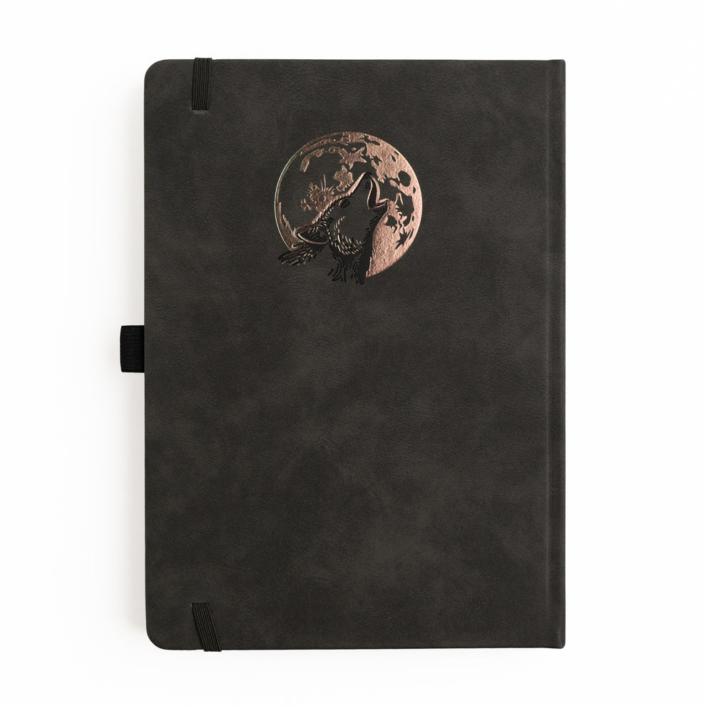 Step quietly into the moonlit forest with the Wolf in the Night Notebook, where every page invites you to embrace your intuition and let your creativity roam free.
