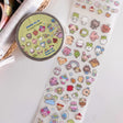 Add endless charm to your creative projects with this Large Sticker Roll — a journaling essential designed for versatility and fun!

Measuring 70mm wide and 5 meters long, each roll is packed with beautifully illustrated stickers printed on a frosted clear matte material that blends seamlessly into any spread, planner, or scrapbook page.

Whether you’re highlighting daily moments, decorating your bullet journal, or personalizing penpal letters, these rolls offer both variety and volume. Each design features