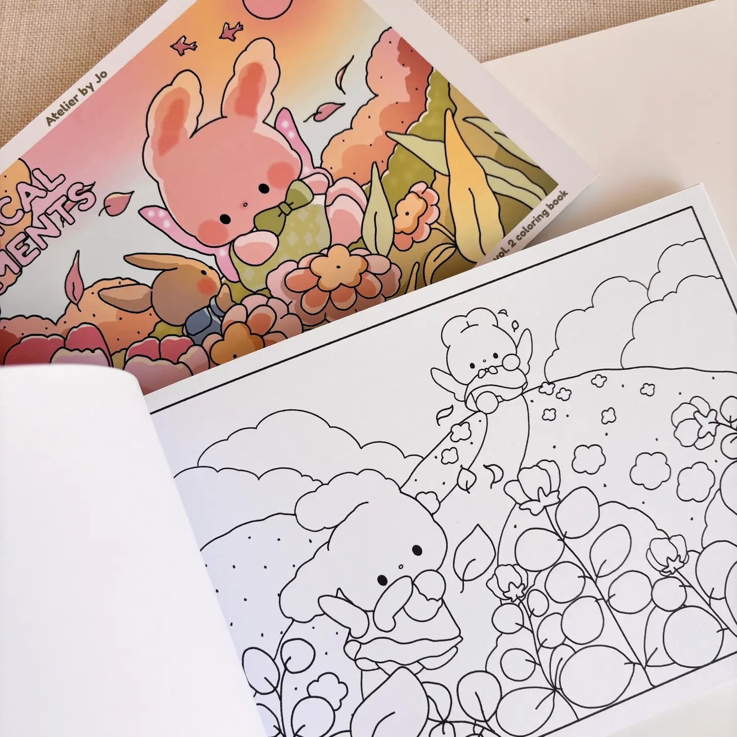 🌿✨ Wander into Whimsy with Magical Moments Coloring Book Vol. 2! ✨🌿

Step into an enchanted world where forest paths lead to secret hideaways and a little magic lingers in the air. Featuring 25 original, full-page illustrations, this collection invites you join Cotton and Pluto on their adventures into cozy woodland cottages, sparkling streams, and whimsical escapes hidden deep in the forests

Whether you're curling up on a quiet afternoon or seeking a mindful creative escape, these charming, nature-inspi