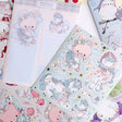 Introducing larger stickers to be the center of focus in your journal spreads! These detailed, illustrated stickers will add a cozy flair to any journal.

Product details:

135 mm x 160 mm sticker sheet.
Matte with Foil
135 mm x 180 mm memo sticker sheet backing - writable.