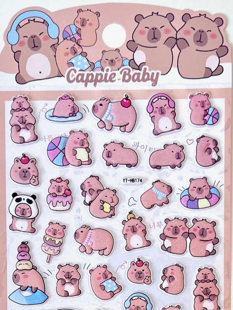 Bring irresistible cuteness to your journal, planner, or craft projects with the Capybara Puffy Sticker Sheet – Vol. 7 from BC Mini. These soft, squishy puffy stickers feature charming capybara characters in playful poses, perfect for adding a cheerful pop of personality to any page.

Puffy sticker sheet
Includes 1 sticker sheet