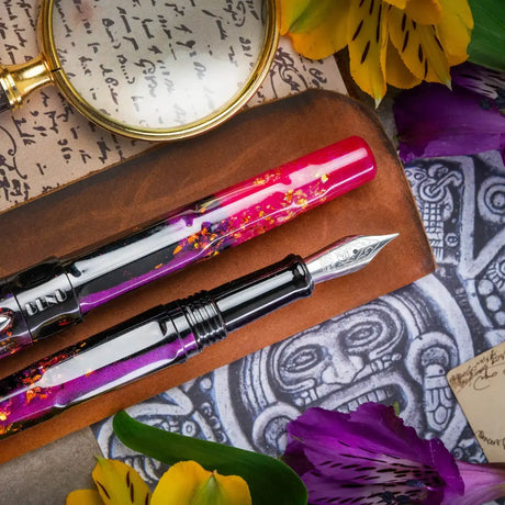 BENU Talisman Fountain Pen - Lily of the Incas

Adorning landscapes with its vibrant hues and captivating hearts with its rich history, the Lily of the Incas serves as the perfect inspiration for the namesake BENU creation.

Also known as Alstroemeria, this delicate marvel dates back to the Inca civilization, when it was revered as a divine gift from the Sun God. The Incas cherished its presence not only for its radiance but also for its believed otherworldly capabilities — from invisibility to the power of