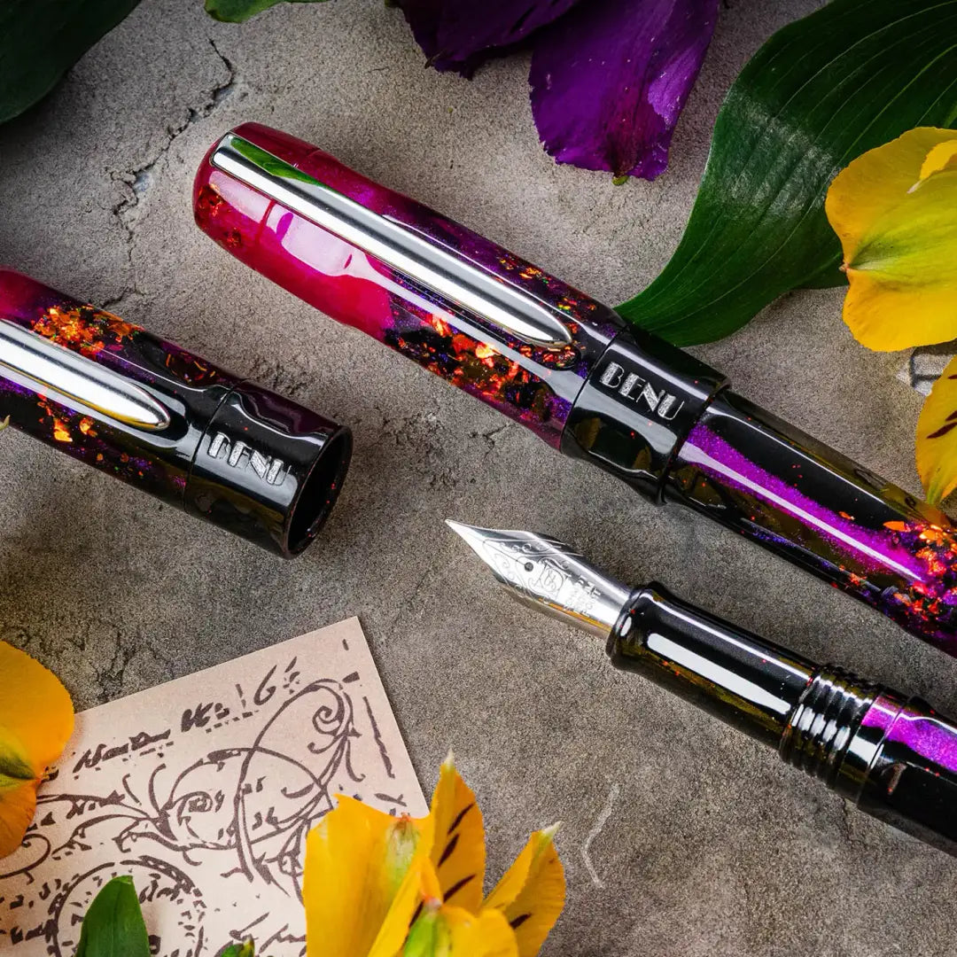 BENU Talisman Fountain Pen - Lily of the Incas

Adorning landscapes with its vibrant hues and captivating hearts with its rich history, the Lily of the Incas serves as the perfect inspiration for the namesake BENU creation.

Also known as Alstroemeria, this delicate marvel dates back to the Inca civilization, when it was revered as a divine gift from the Sun God. The Incas cherished its presence not only for its radiance but also for its believed otherworldly capabilities — from invisibility to the power of