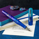 BENU Talisman Fountain Pen - Peacock Ore

Peacock Ore, with its spectacular iridescent tarnish effect, is one of nature’s most colorful minerals. Those who believe in the healing powers of crystals call it the “stone of happiness”. Believed to head us in positive directions and help channel happiness onto others, crystal enthusiasts claim this to be a truly uplifting stone.&nbsp;

Drawing inspiration from certain tales of yore, we set out to convey these stories not only in the color and style of each pen, 