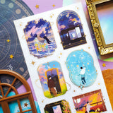 🌙⭐ Wanna get even further away? @9jedit’s got you covered with this stellar celestial set. Sometimes we can only escape in our daydreams and why would we want that to be ordinary? Think cozy reads under crescent moons, ferris wheel rides through cotton candy skies, and portals to worlds that aren’t planet earth. Take us away!

Art by: @9jedit

Top Coating: Gold foil

Adhesive Layer: PVC (plastic)

Backing Layer: Clear PET

6.69" x 3.54". Weight - 0.03lbs.

1 sheet included