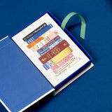 Brimming with an abundance of bookish delights, these 50 postcards feature book stacks, literary icons, libraries, authors, and more! Designed to look like a book with touches of foil, the keepsake box will be a treasured gift for literary lovers.