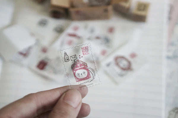 Box size: 4 x 3 x 3 cm

Packed with cuteness, this tiny treasure features 6 different mini stamp designs - plus a PET sticker pack.

The stamps are made of industrial high grade red rubber with the finest details. It is mounted by hand on re-purposed wood, hand-picked from various sources from old furnitures to jungle excursions! As all stamps are assembled, cut, sanded by hand, size and shape may vary slightly. Wood material will differ depending on what the forest elves bring!