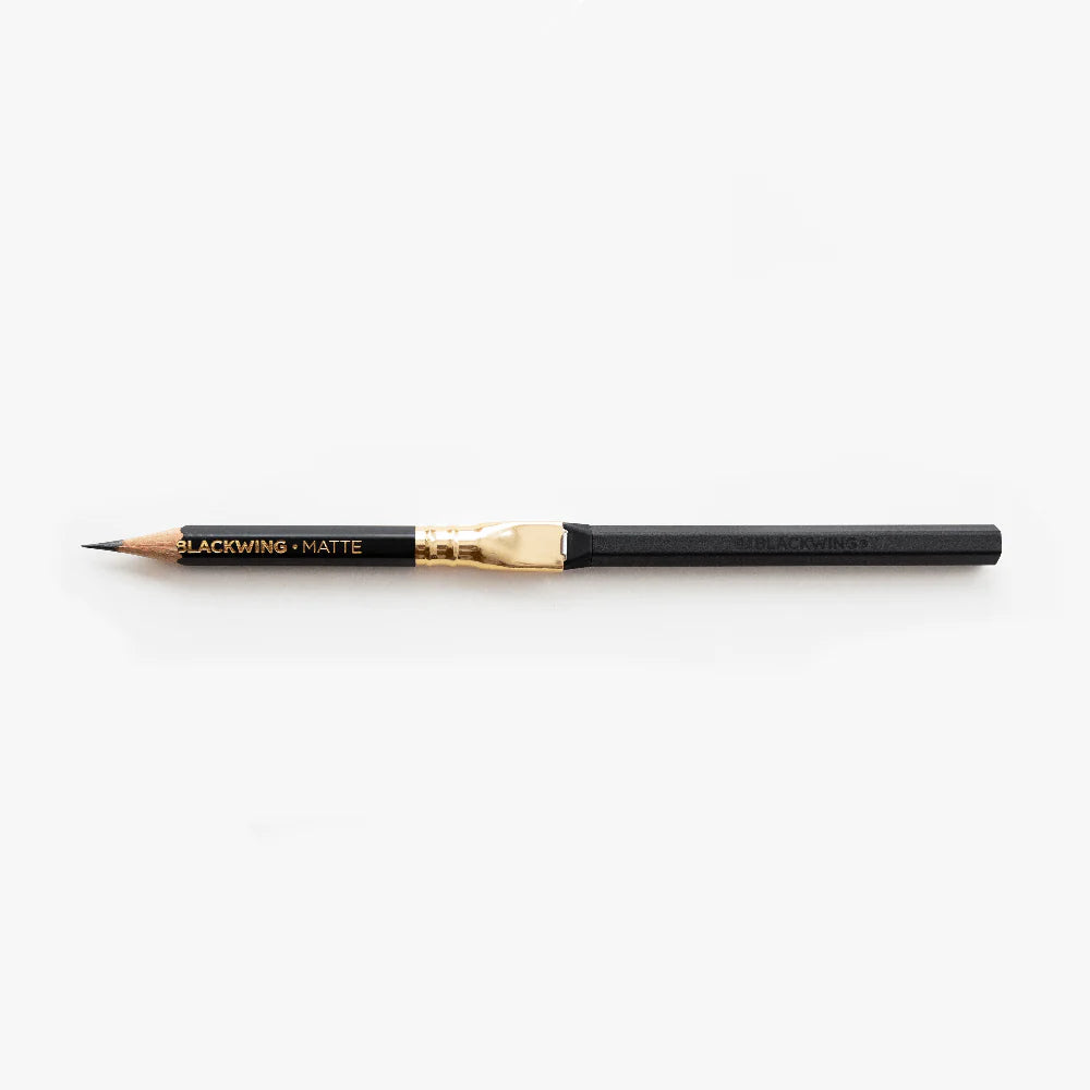 Breathe new life into those pencil nubs you've been saving and prolong the lifespan of your Blackwings with the Pencil Extender. The simple design allows the extender to slide into the clip of the existing Blackwing ferrule. The extender works with all Blackwing pencil models.

Each Blackwing Pencil Extender is made with machined aluminum and features a firm rubber tip to ensure a snug fit, making it feel like you’re holding a regular pencil.
