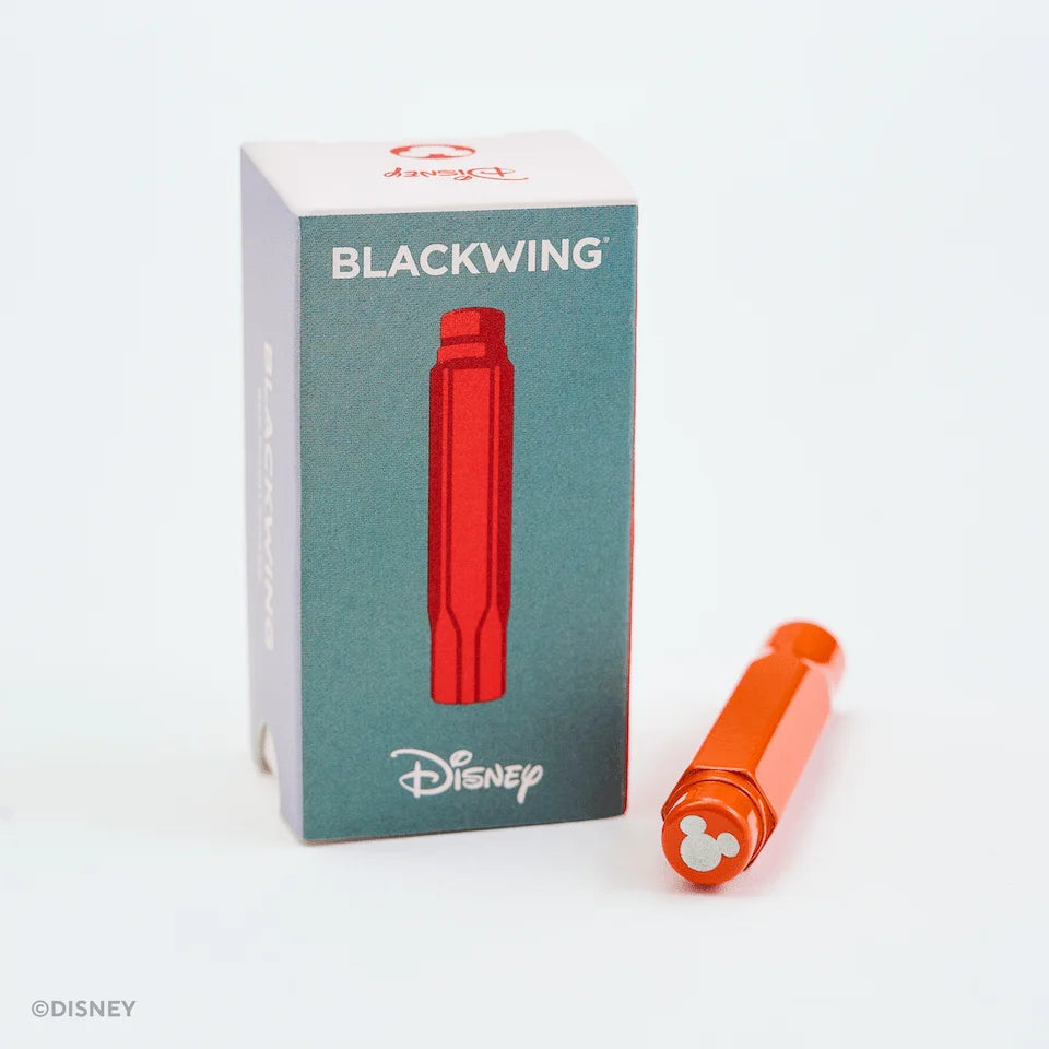 This Notebook Essentials Set includes 6 Blackwing pencils featuring Mickey Mouse, Minnie Mouse, Pluto, Goofy, Donald Duck, and Daisy Duck. It also includes a Mickey Mouse Pencil Sharpener, a Mickey Mouse Point Guard, and a medium Mickey & Minnie Mouse notebook with blank paper.