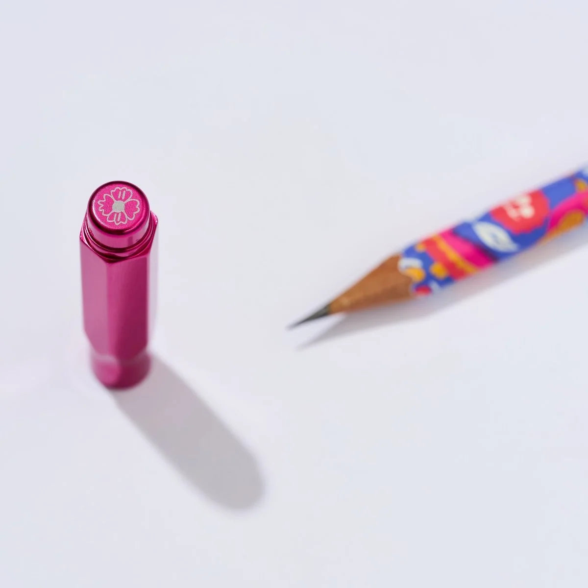 Blackwing - Volume 143 Frida Kahlo Point Guard

This limited-edition fuchsia-colored Volumes 143 Point Guard features a floral icon on the top. Volume 143 is our tribute to Frida Kahlo. The model number 143 is a nod to the 143 paintings commonly attributed to her over the course of her life.&nbsp; The tip of your pencil “floats” inside the cap to protect your point against unexpected drops or jams.



Details:
- Lightweight, machined aluminum
- Set of 1
- Goes over tip of pencil
