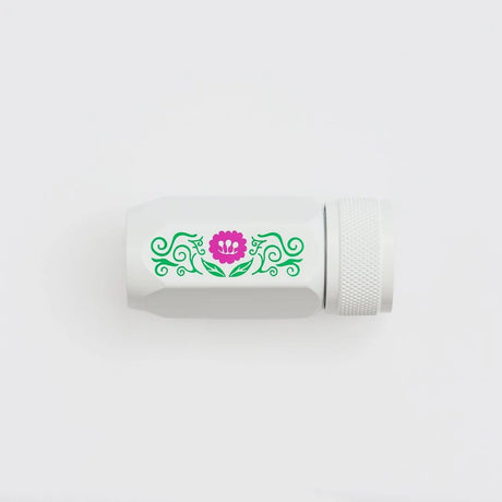 Volume 143 is our tribute to Frida Kahlo. The model number 143 is a nod to the 143 paintings commonly attributed to her over the course of her life.

This limited-edition Volume 143 Blackwing Long Point One-Step Sharpener comes in white with a Frida Kahlo-inspired floral design on the side. The sharpener body is made of durable, machined aluminum, and the sharpening unit features a premium German steel blade for consistent pencil sharpening. The canister can hold three fresh pencil sharpenings before needin
