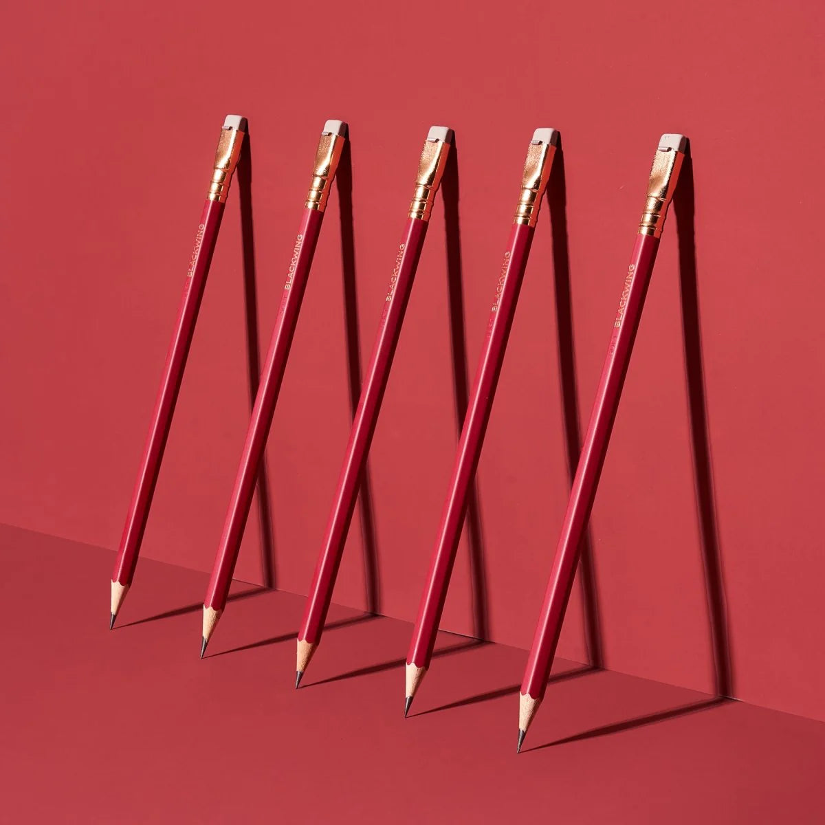 This colorway has a matte red finish, copper imprint, copper ferrule, and light gray eraser. It features a “SOFT” pencil graphite indicator stamp on the barrel. Not to be confused with our red core pencils, this is a graphite pencil with a red barrel. This pencil is ideal for musicians, woodworkers, and anyone who prefers a soft, dark graphite line. The Blackwing Matte is the softest of the four core Blackwing models.

Blackwing Matte pencils come in a 12-pack gift box that also doubles as a pencil cup. The