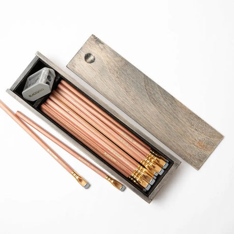 Blackwing Rustic Box Set - Natural

The Blackwing Rustic Box features your choice of 12 premium Blackwing graphite pencils and our reliable Two-Step Long Point Sharpener. Choose from 12 Matte pencils,12 602 pencils, 12 Pearl pencils, 12 Natural pencils, or 3 of each. The aged pine pencil box slides open to reveal the Blackwing pencils and a black cork-lined interior. The smooth stationery box is perfect for any workspace, office, or desk.

All Rustic Boxes now come with our Grey Two-Step Long Point Sharpene