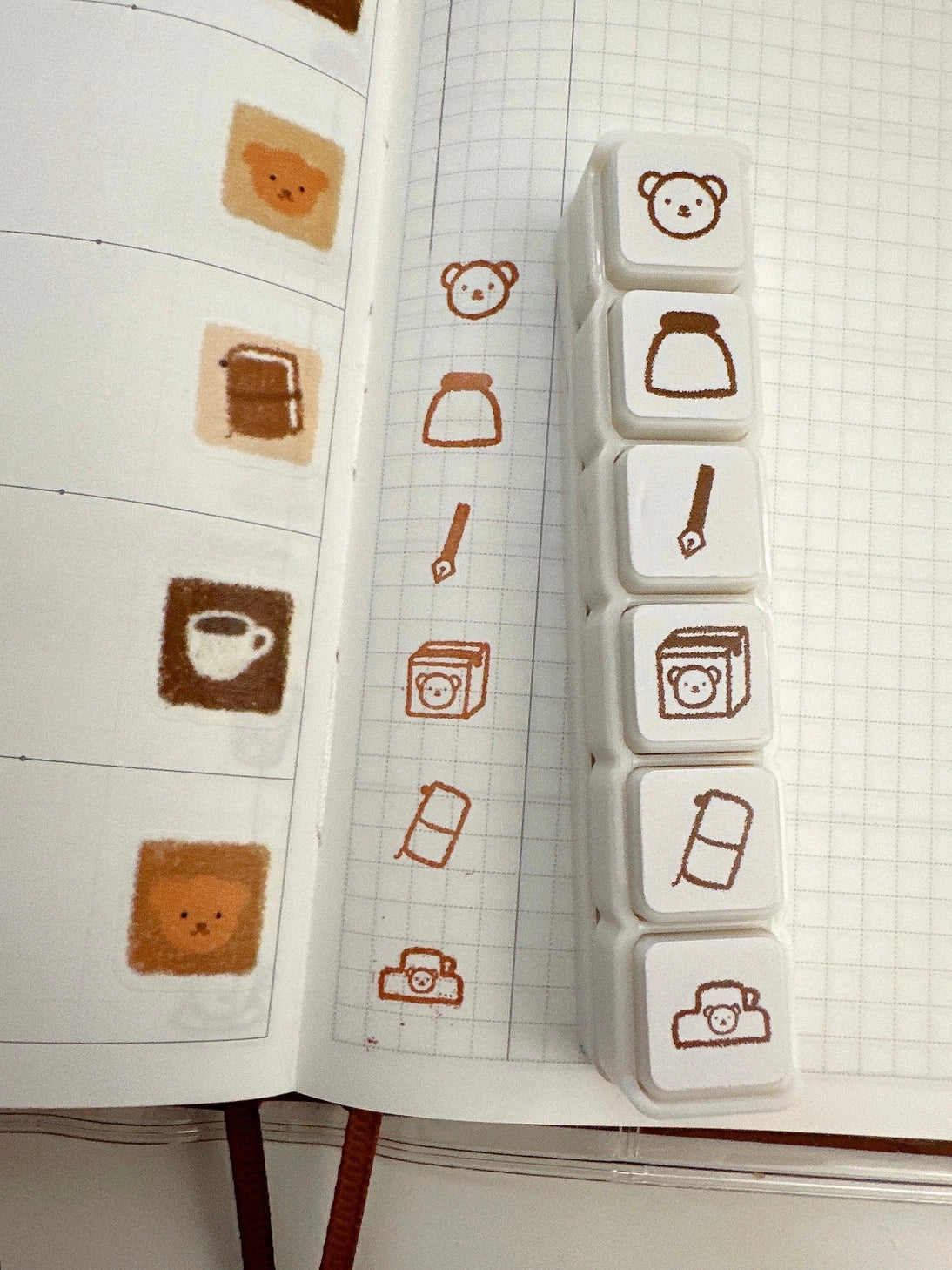 This button stamp captures Bear's favorite things!!

Fountain pens, inks, happy mail, planners, and clips!!

Our stamps add a sweet and cute touch to your planner or journal. Add them in your journaling, planning, and memory keeping spreads!

Stamped image is approximately 0.8cm wide.
