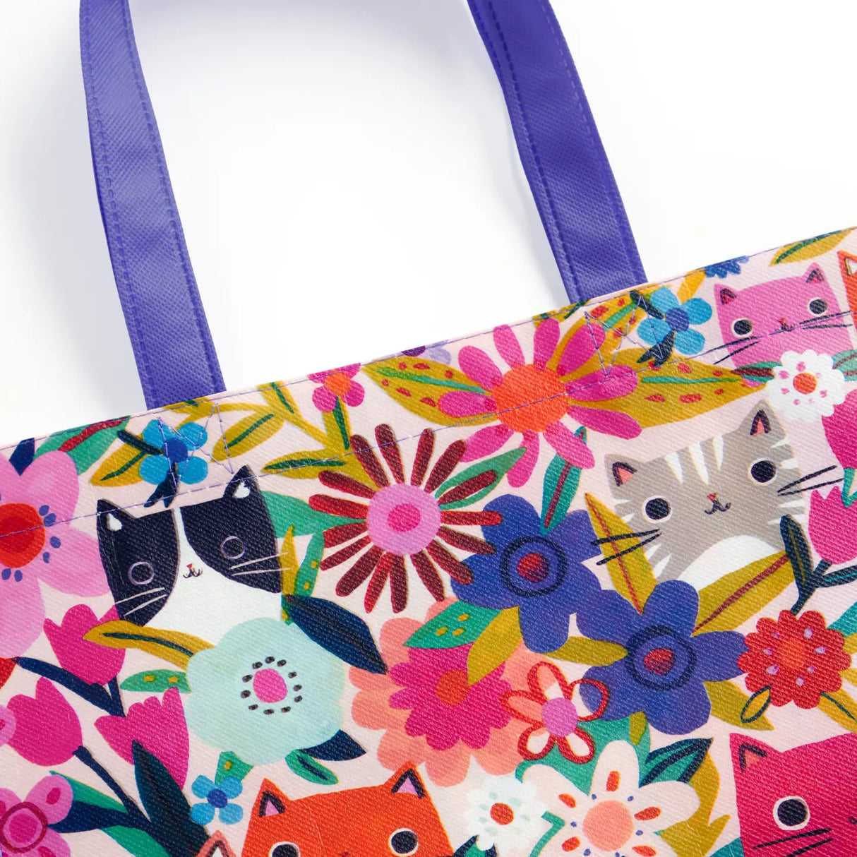 Our new Blooming Cats reusable shopping bag features illustrations of adorable cats among blooming flowers while being stylish and eco-friendly. The bag is also spacious and roomy, with plenty of space to hold all your essentials. It's also lightweight and easy to carry, making it perfect for everyday use. This unique shopping bag is a great way to show off your style while also doing your part for the environment.