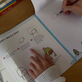 Bobbie Goods - Cozy Coloring &amp; Drawing

Brrrr!! ❄️ This two-in-one book offers 32 pages of step-by-step drawing projects that guide budding artists through creating cozy Bobbie Goods characters, winter scenes, and adorable objects. In addition to the tutorials, an attached pad includes 6 unique winter coloring pages and 6 memo sheets.&nbsp;

Inside, you’ll find:

Step-by-step winter theme drawing tutorials
An attached pad with 6 cozy coloring pages and 6 cute drawing pages