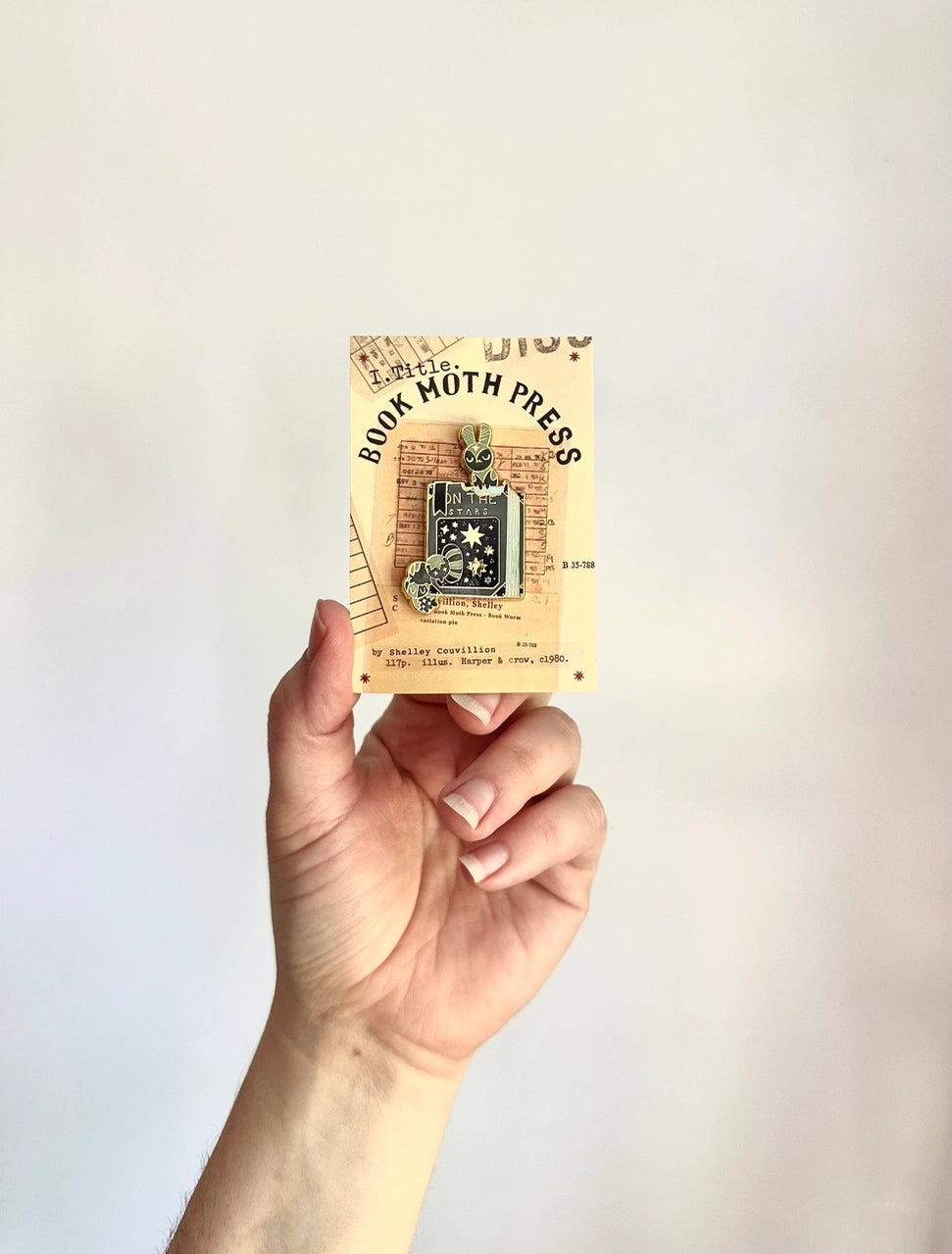 These pins are a lovely, small and cute piece to show off on your clothes, book bags, or wherever you show off your pins!

1.65 inches tall, gold metal lapel pin with "hard" enamel colors. Black rubber clasps. Packaged in a small plastic bag with a card backing.