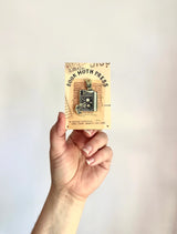 These pins are a lovely, small and cute piece to show off on your clothes, book bags, or wherever you show off your pins!

1.65 inches tall, gold metal lapel pin with "hard" enamel colors. Black rubber clasps. Packaged in a small plastic bag with a card backing.