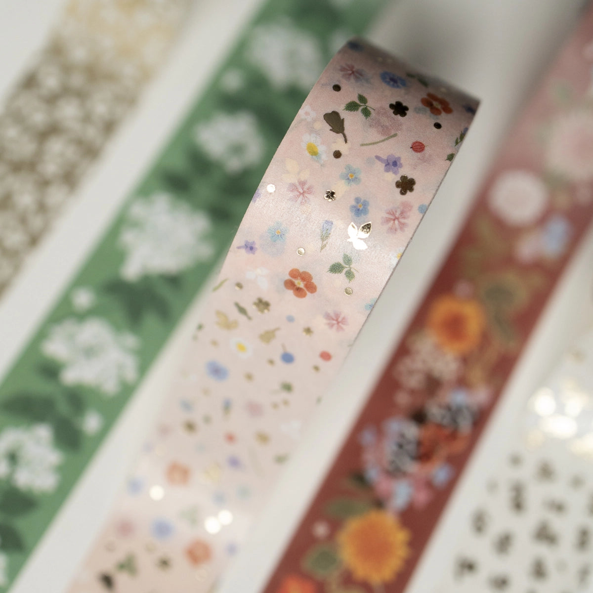 Botanica Paper Co. Floral Confetti Washi Tape


Illustrated adhesive paper tape inspired by florals and vintage stamps. Perfect for decorating your mail, journals, cards, gift tags, scrapbook projects, and more.&nbsp;

Dimensions: 33 ft (10m) roll, 0.75" (20 mm) wide
Gold foil accents
Designed in USA
Includes 1 roll of washi