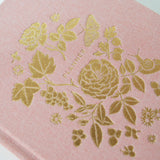 Herbarium | Linen-Bound Undated Planner

Hand-illustrated luxurious undated planner&nbsp;

Size: 6.25"x 8.5" x 0.75"

&nbsp;Lay-flat binding
Cover printed in full color and gold foil stamped
Matte gold foil-gilded edges ~ Full-color Book linen cloth
Illustrated inner pages
2 satin bookmarks
120 gsm natural white interior pages
Back pocket
Undated with room for 12 months
Birthdays and Special events spread
Monthly view located at the start of each month.
Weekly view
Notes pages